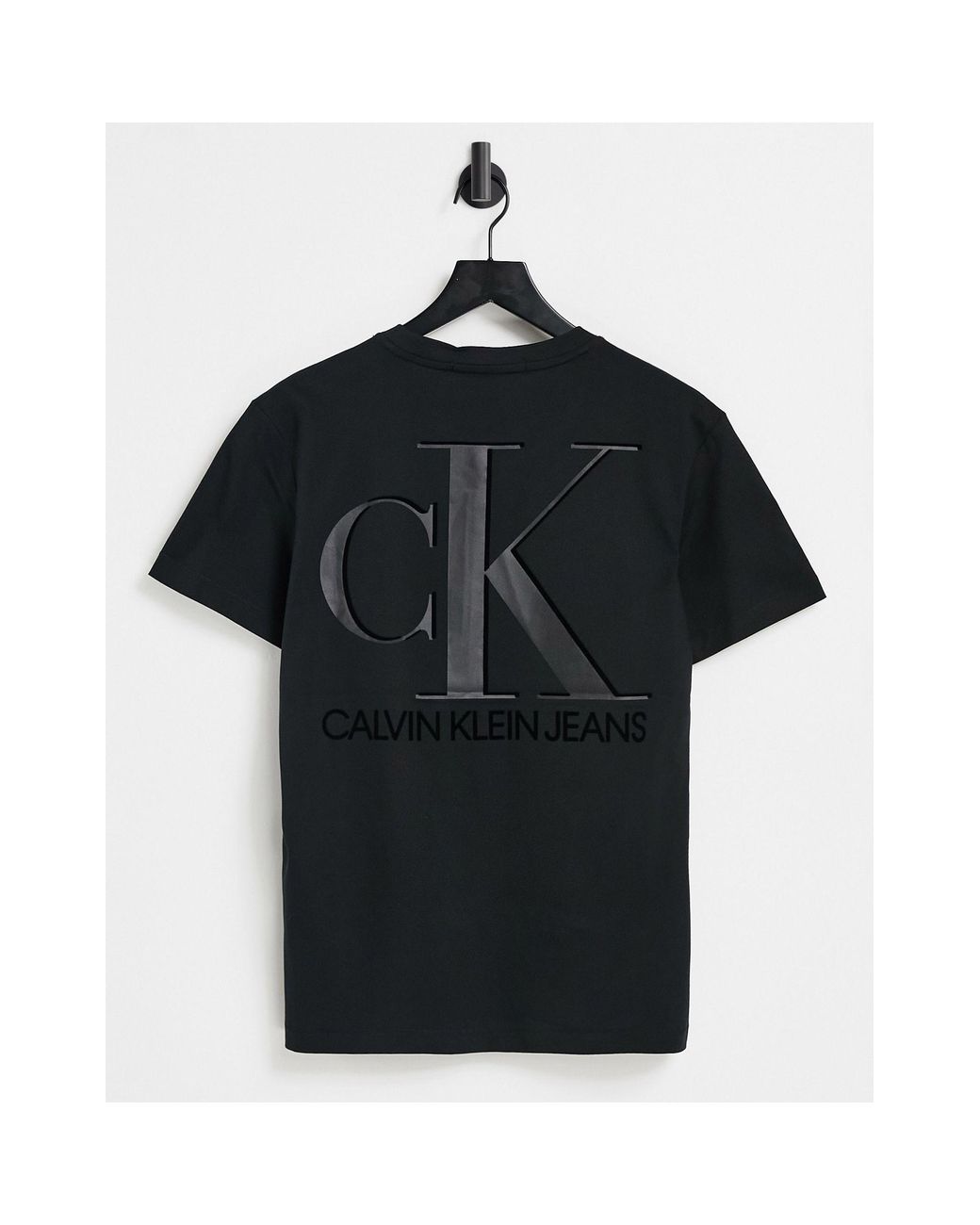 Camiseta negra con estampado en la parte delantera y trasera del logo en  relieve Calvin Klein de hombre de color Negro | Lyst
