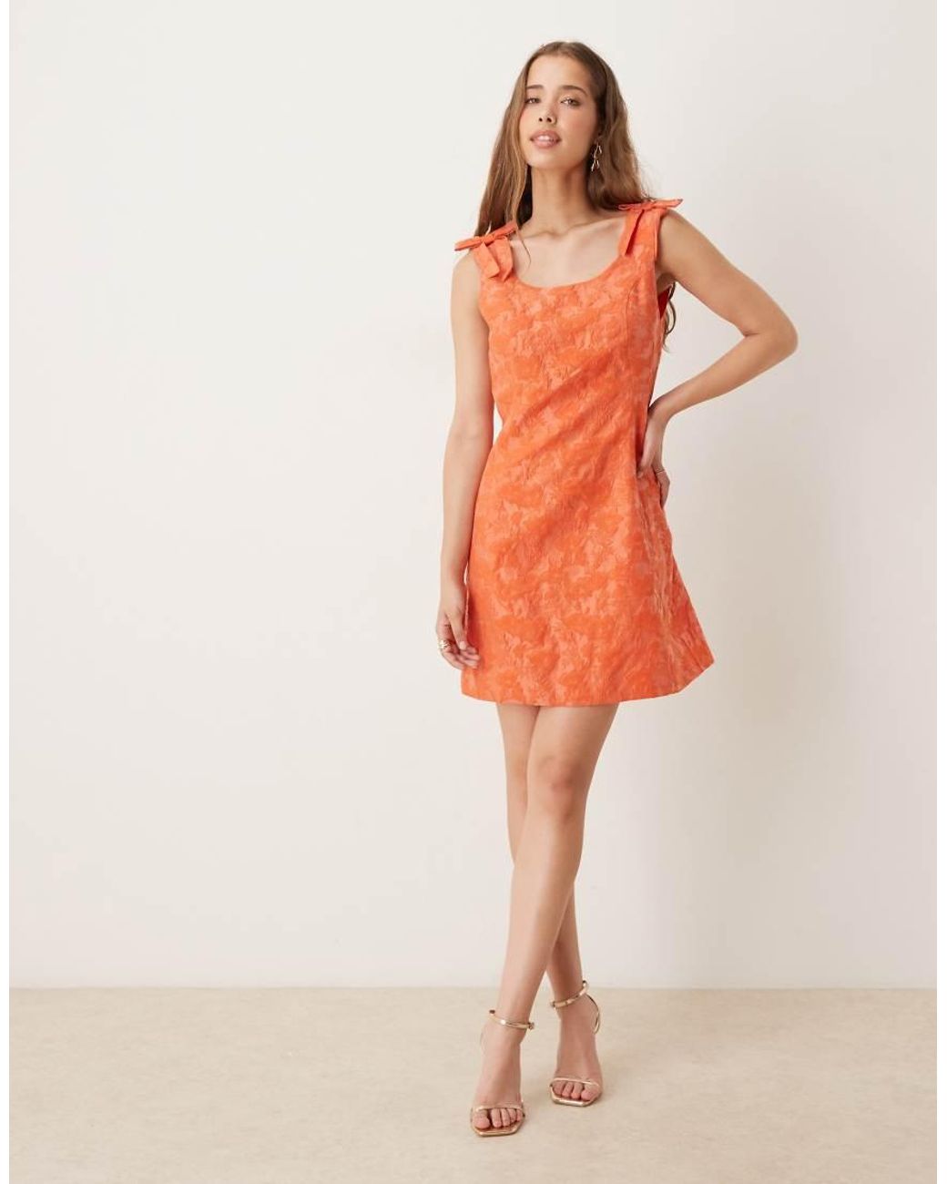 Sister Jane Orange Bow Shoulder Jacquard Mini Dress