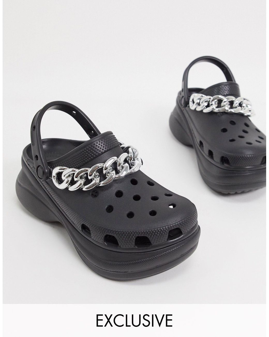 Zuecos negros con plataforma plana detalle Crocs™ de color Negro | Lyst