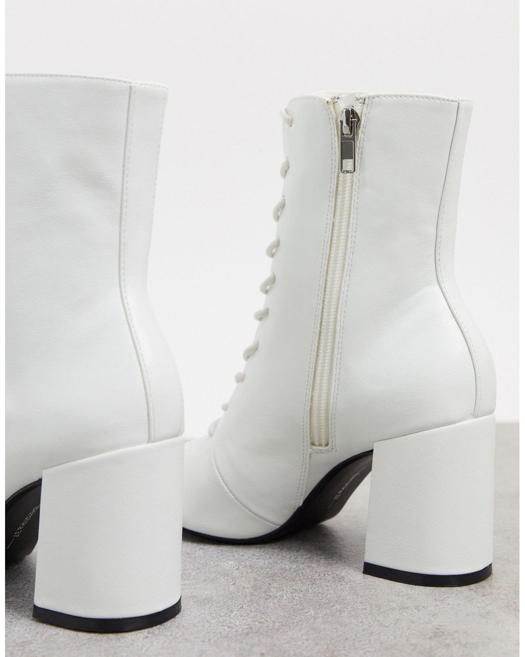 Bershka lace up heeled boot in white Clearance