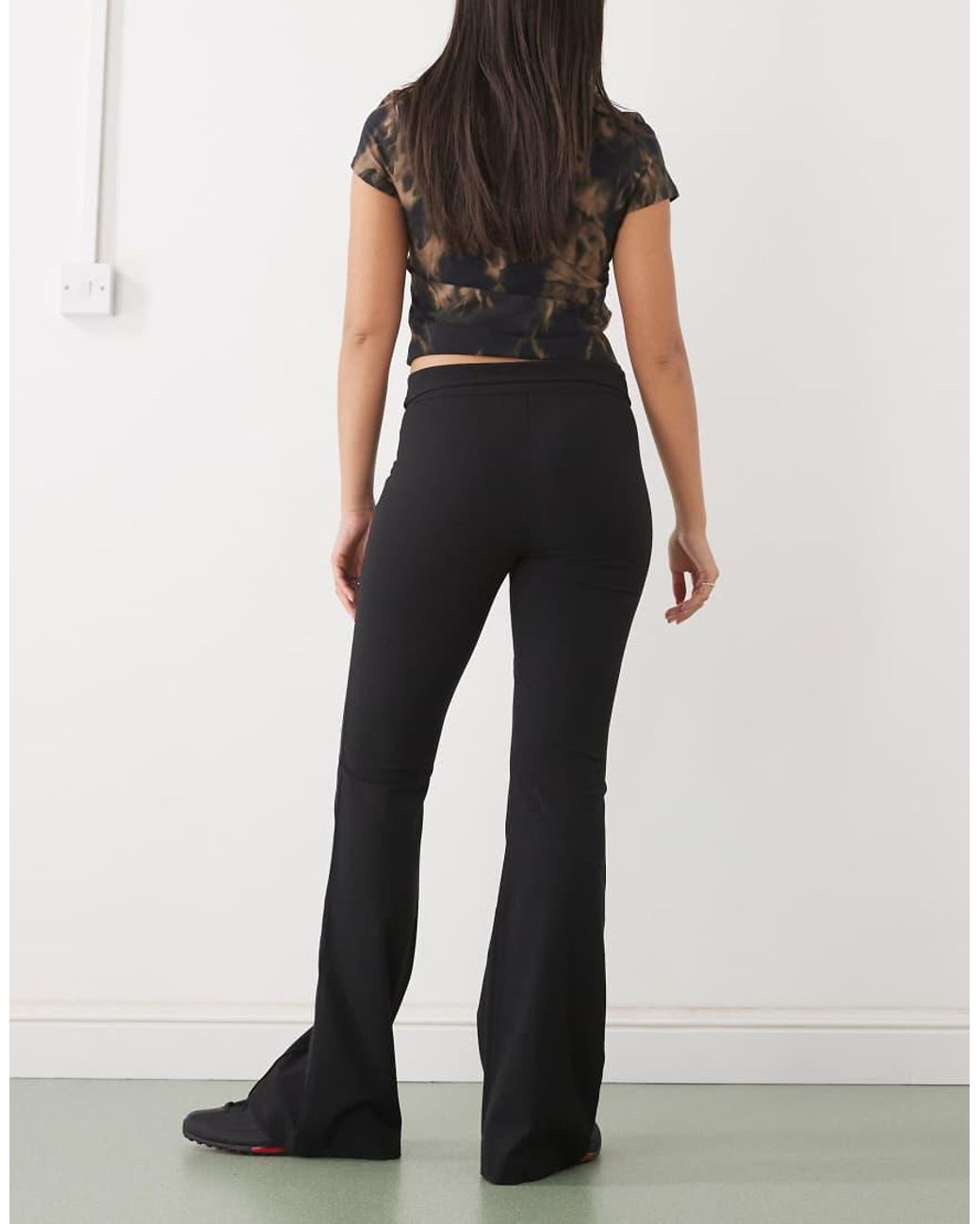 Monki Black Low Rise Flared Trousers With Fold Down Waist Detail