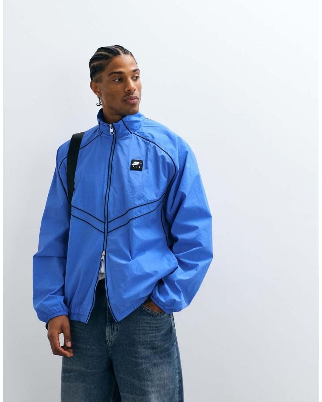 Nike Blue Air Funnel Neck Windrunner Track Jacket for men