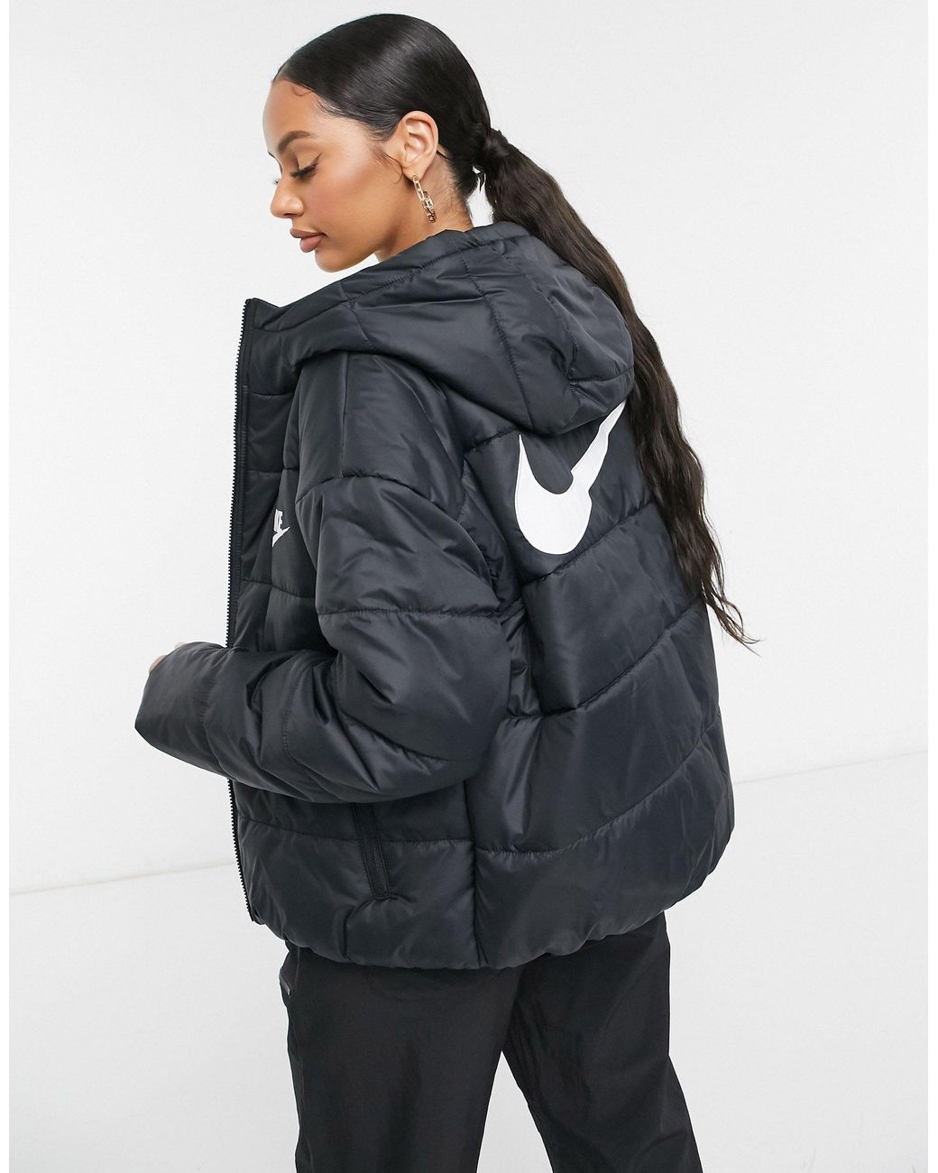Nike Synthetic Padded Jacket With Back Swoosh in Black | Lyst