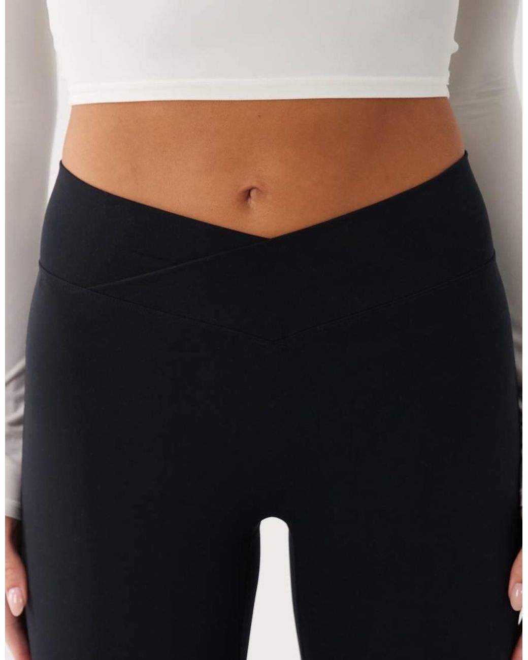 BO+TEE White Cross Over Waistband Flare Leggings