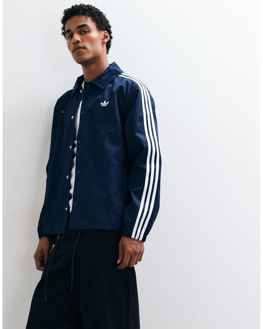 Adidas Originals Blue Three Stripe Coach Jacket for men