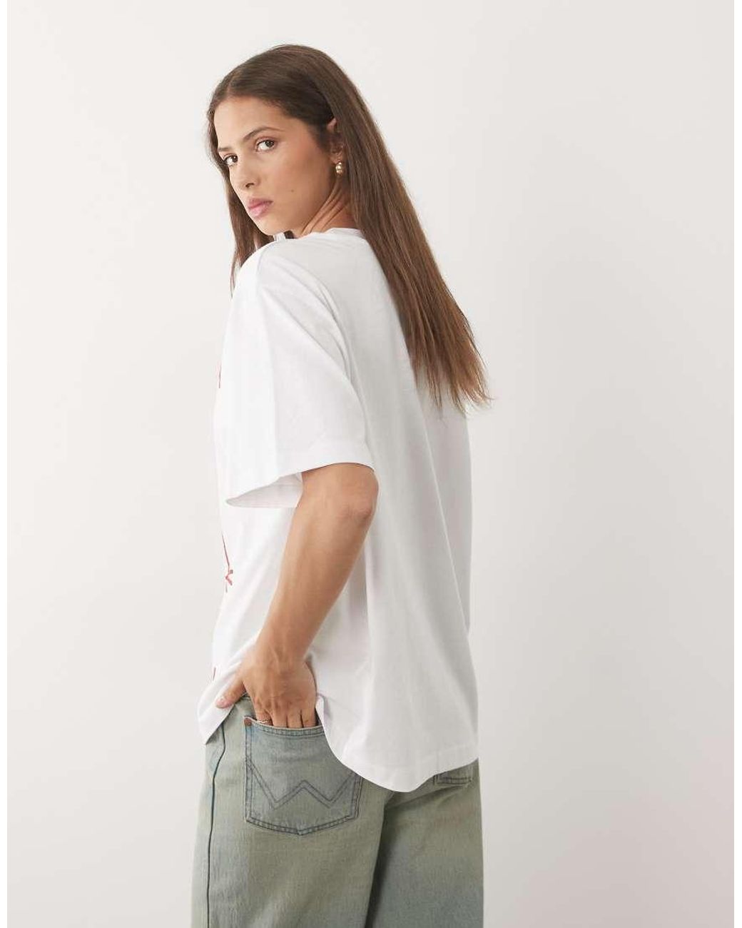 ASOS White Oversized T-shirt With Arizona Cowboy Boot Graphic