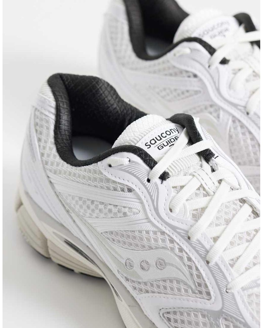 Progrid Guide 7 E Nero di Saucony in White da Uomo