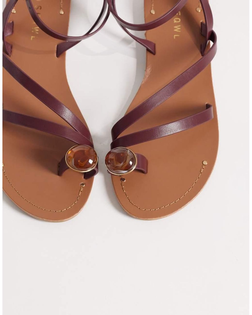 SEQWL Red Strappy Flat Sandals With Toe Embellishment