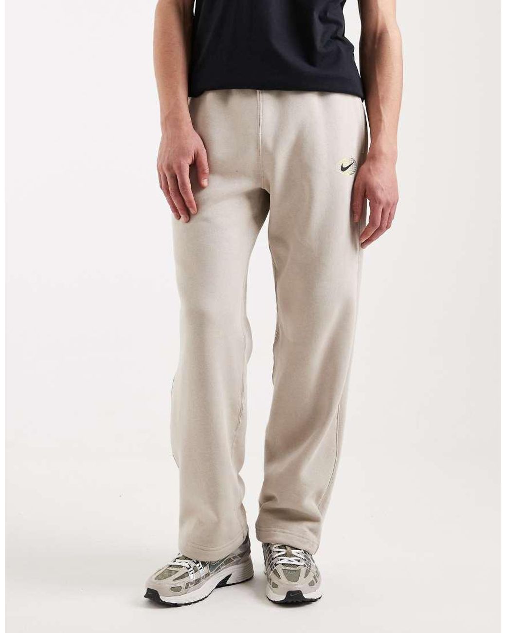 Nike White Athletic Club Graphic joggers for men