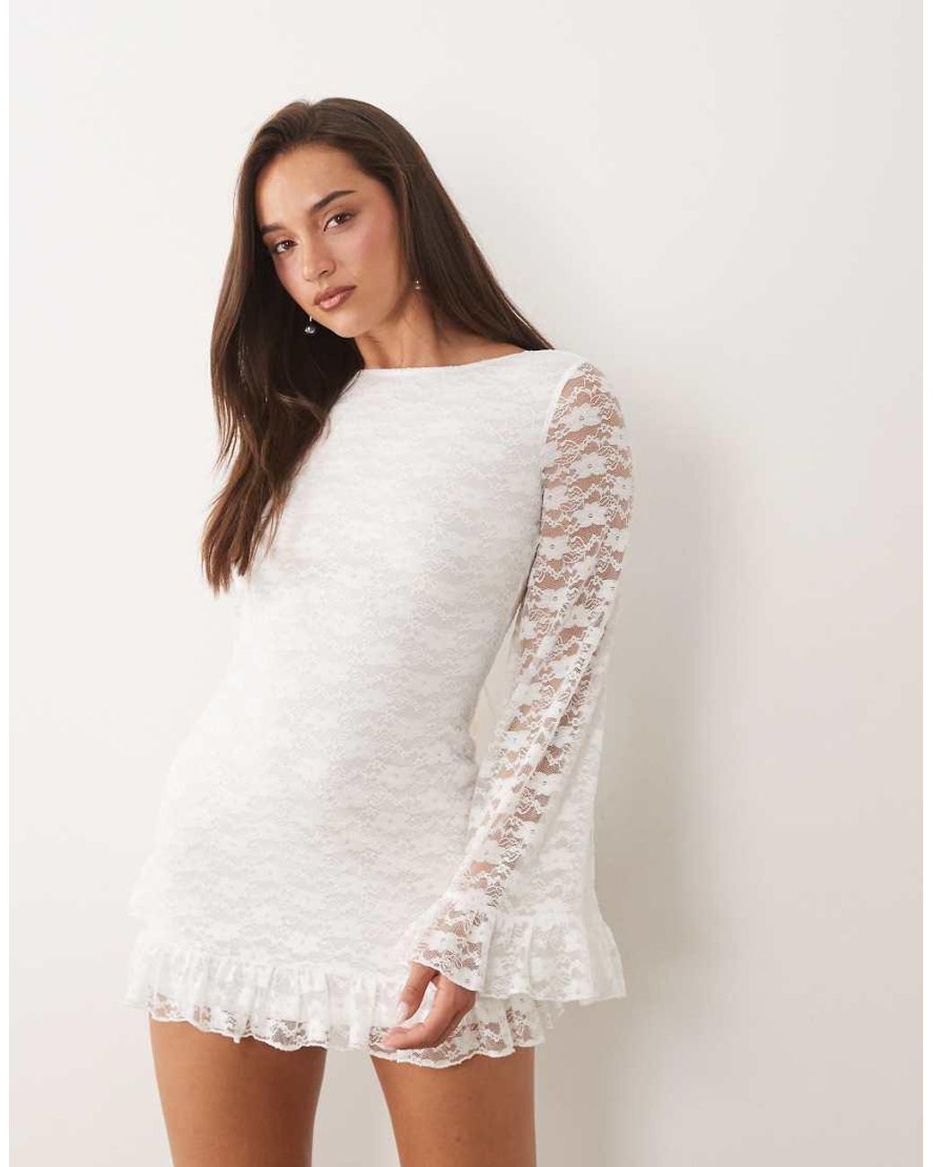 The Frolic White Exclusive Boat Neck Open Back Frill Sleeve & Hem Mini Dress