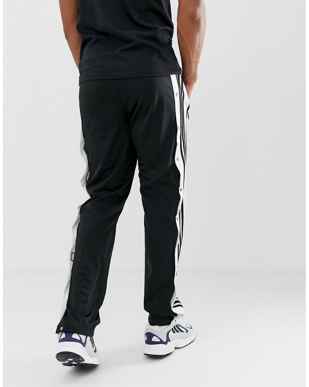 Joggers negros con botones de presión adidas Originals de hombre de color  Negro | Lyst