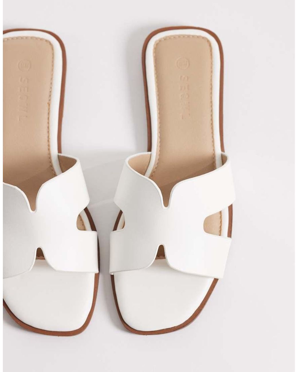 SEQWL White Storke Flat Sandals