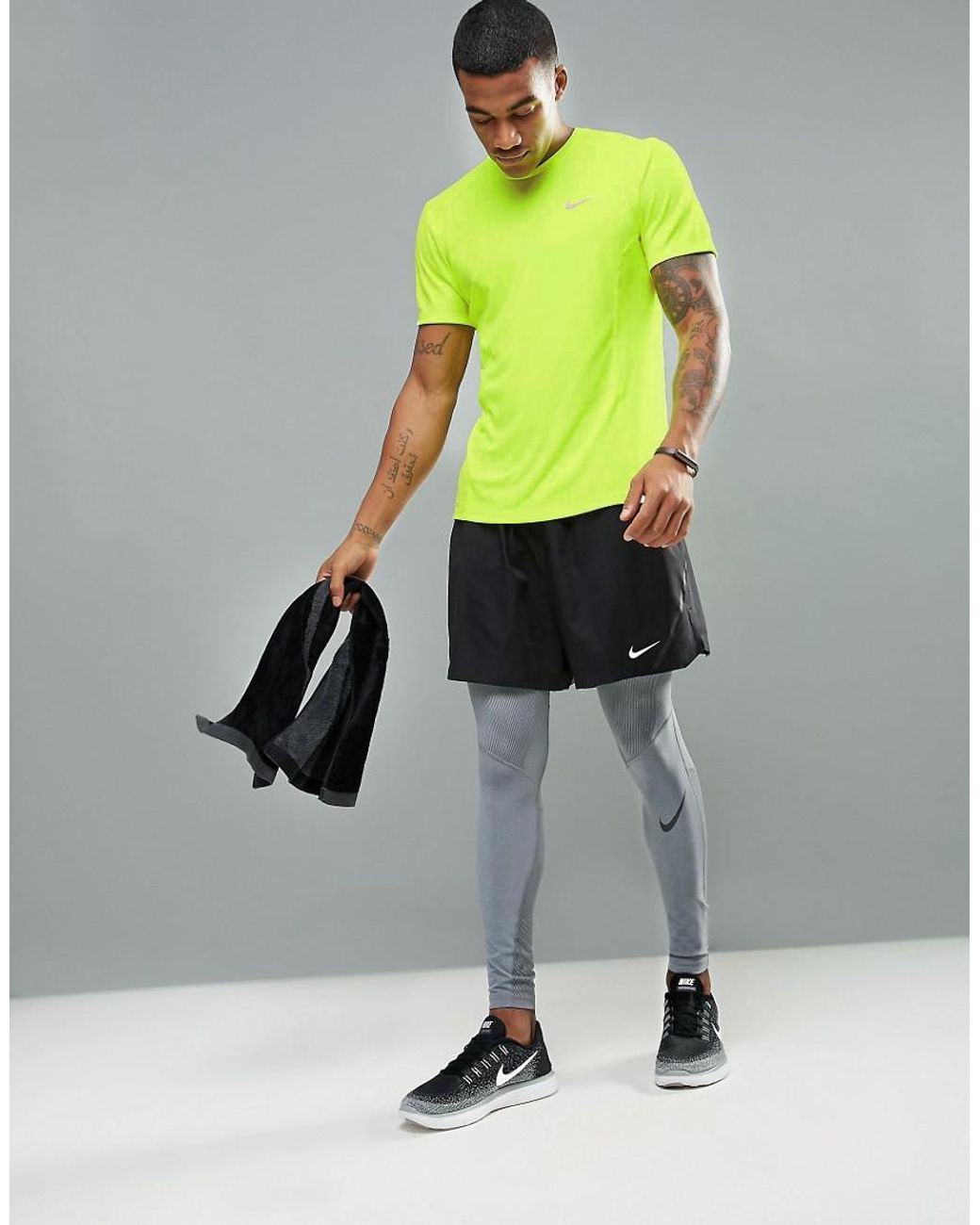 Nike Synthetic Nike Dri-fit Miler T-shirt In Yellow 683527-702 for Men |  Lyst UK