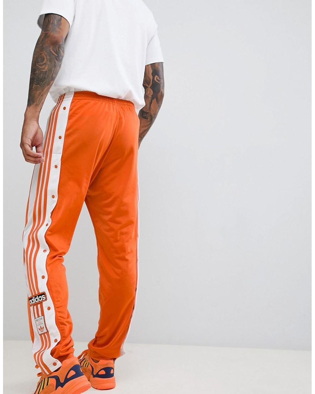 adidas Originals Adibreak Popper Sweatpants In Orange Dh5750 for Men | Lyst