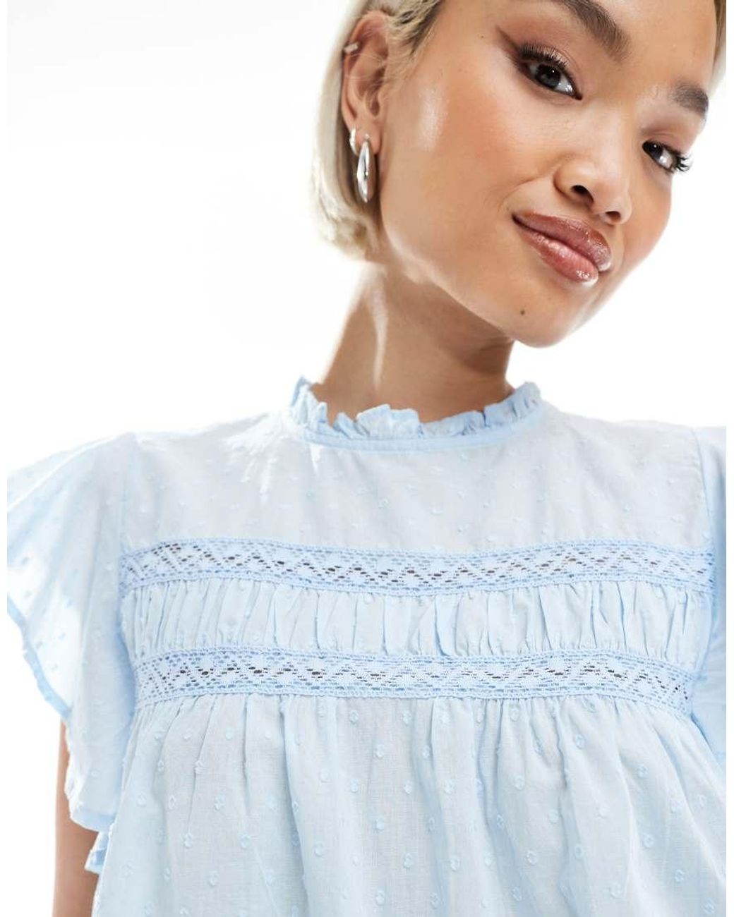 Vero Moda Blue High Neck Flutter Sleeved Embroidered Top