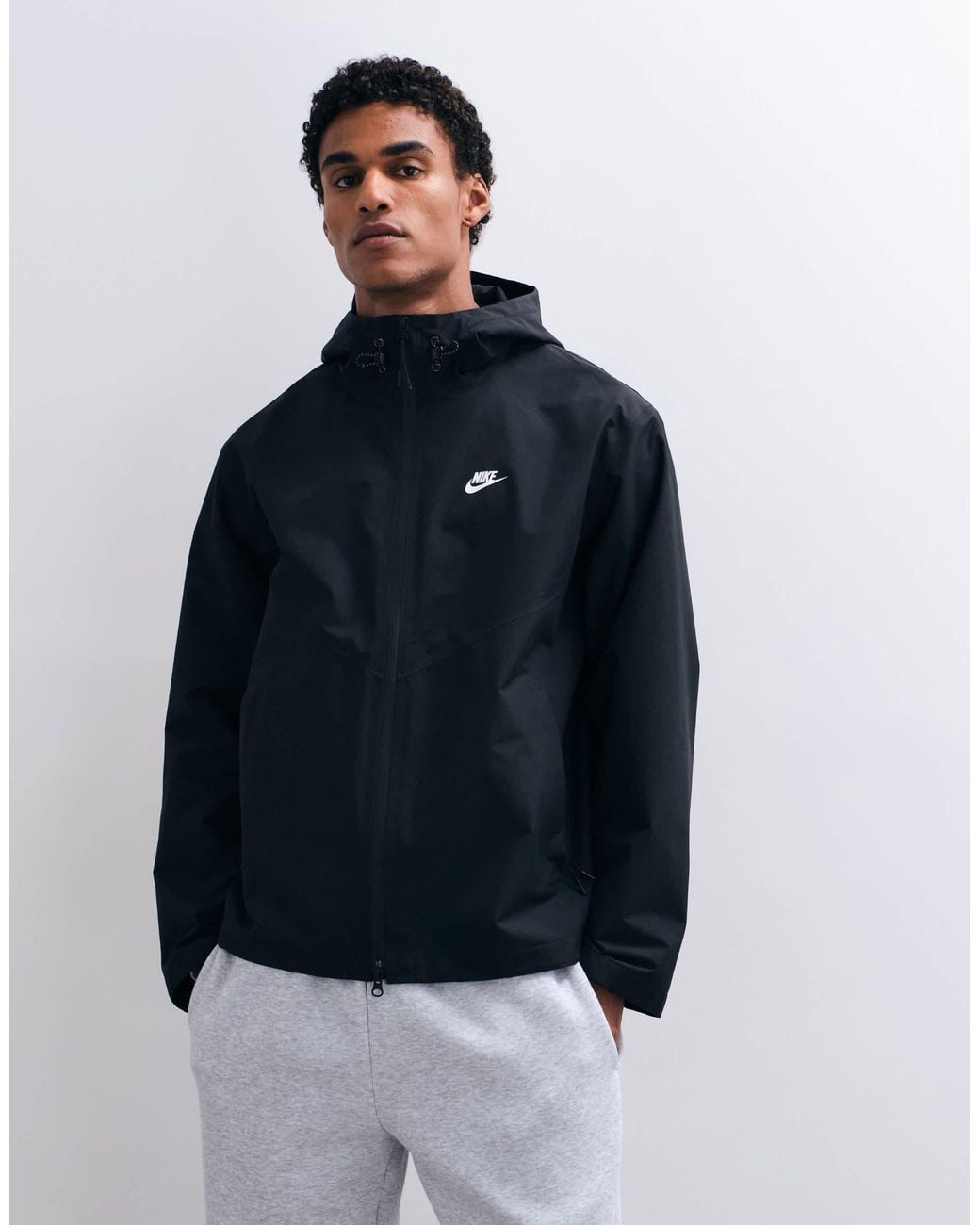 Windrunner veste à capuche imperméable e Nike pour homme en coloris Blue