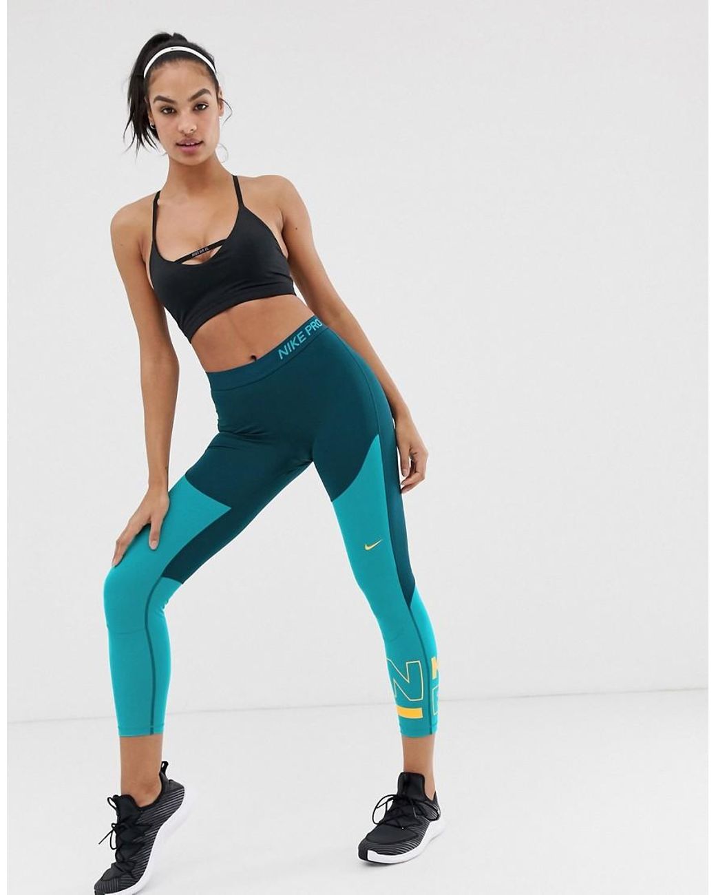 Nike Color Block leggings In Teal And Navy in Blue | Lyst