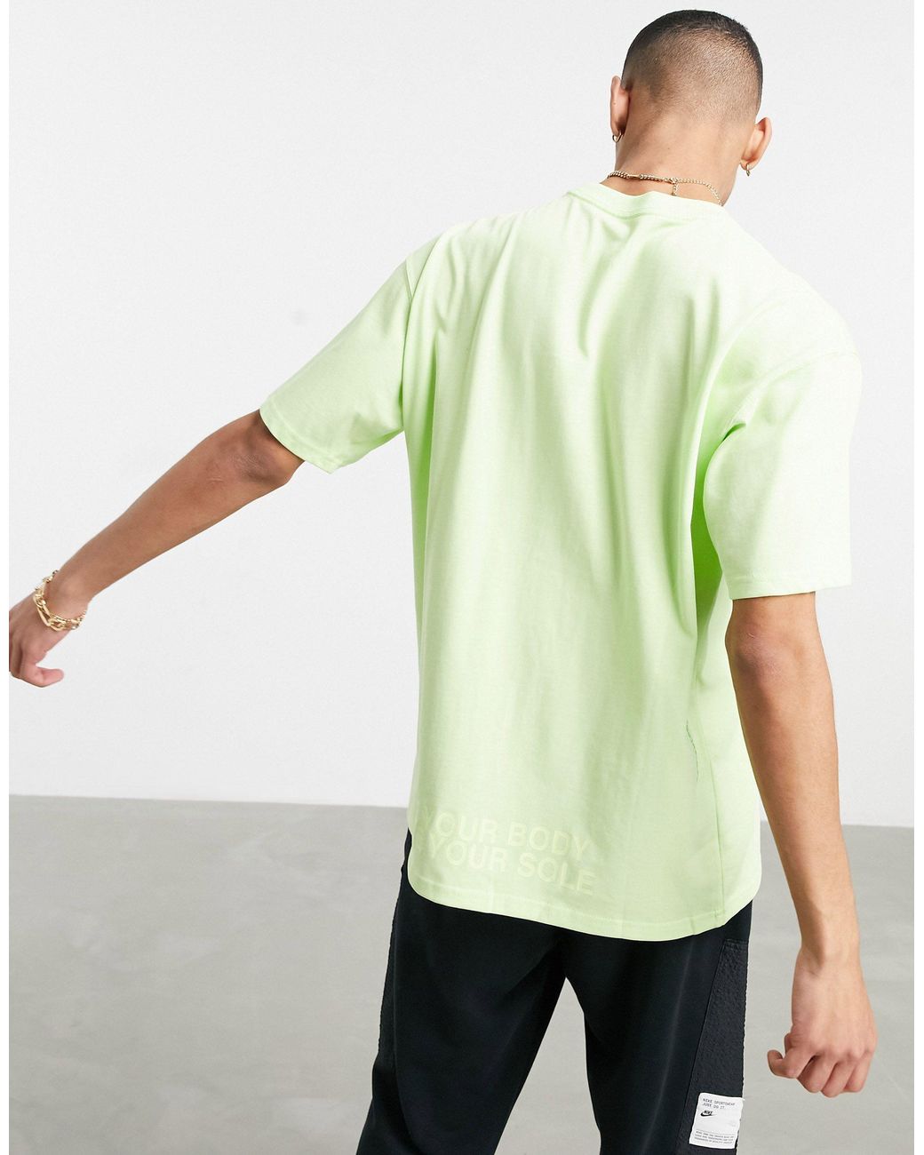 Nike World Tour Pack Graphic Oversized T-shirt in Green for Men | Lyst