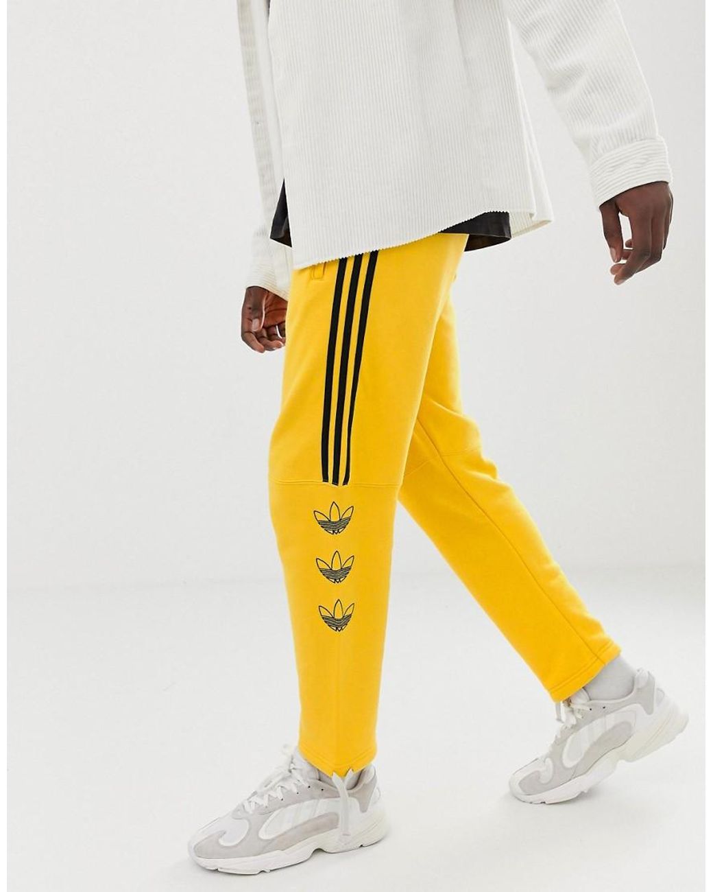 yellow adidas sweatpants