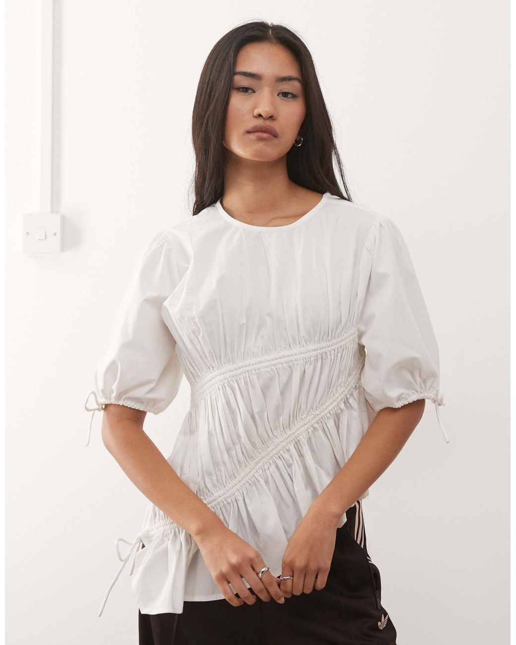 Blouse avec liens Collusion en coloris White