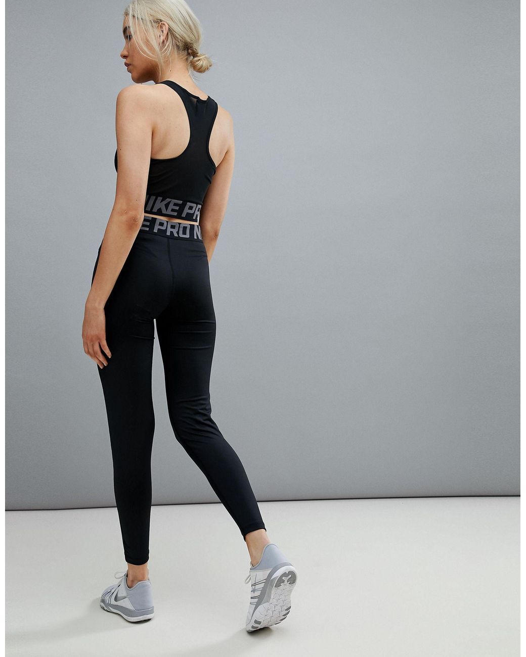 Nike Nike – pro training – e leggings mit überkreuztem design in Schwarz