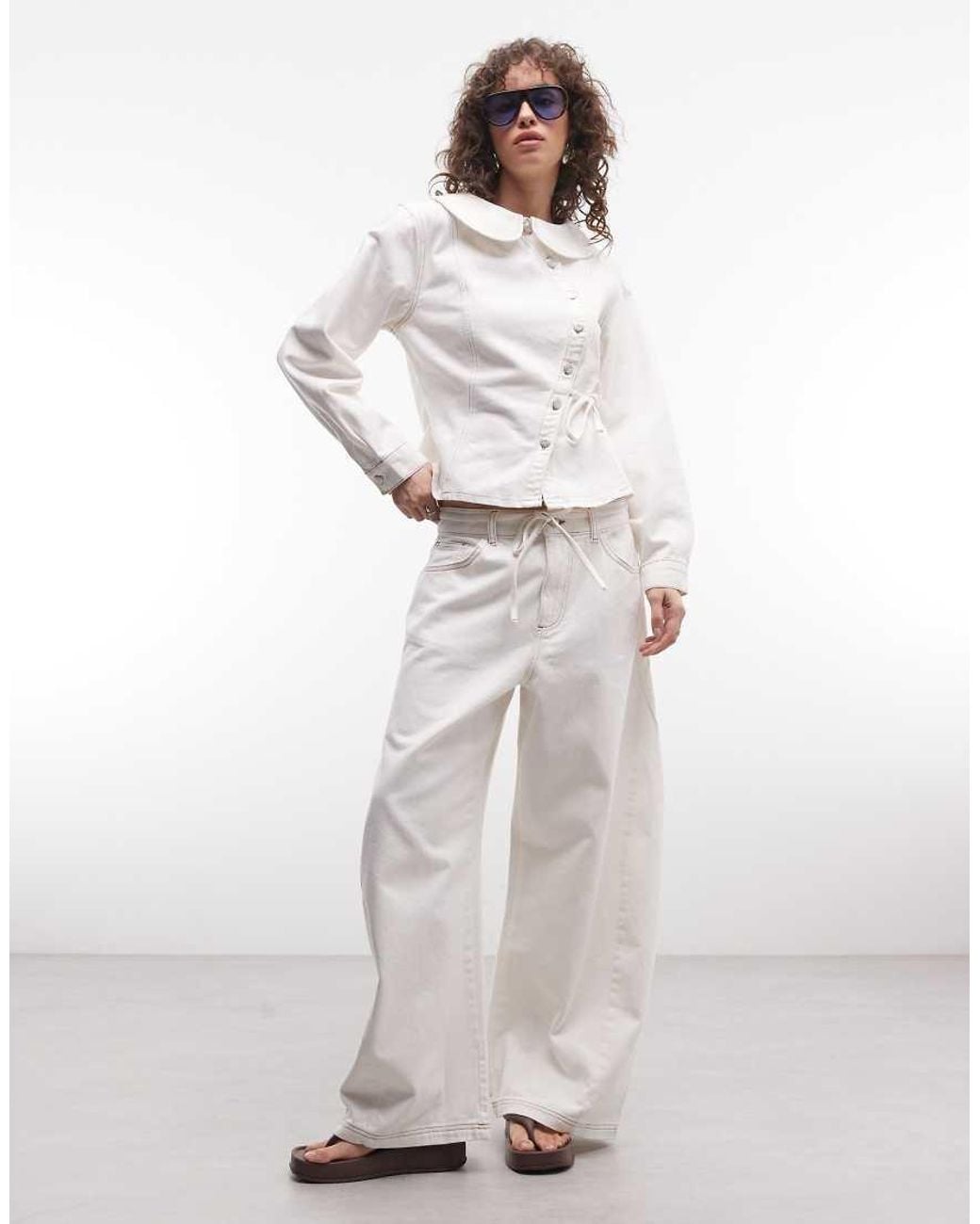 Reclaimed Vintage White Denim baggy Wide Leg Jeans With Tie Detail