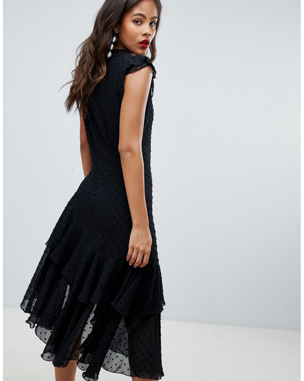 black spotted asymmetrical dress