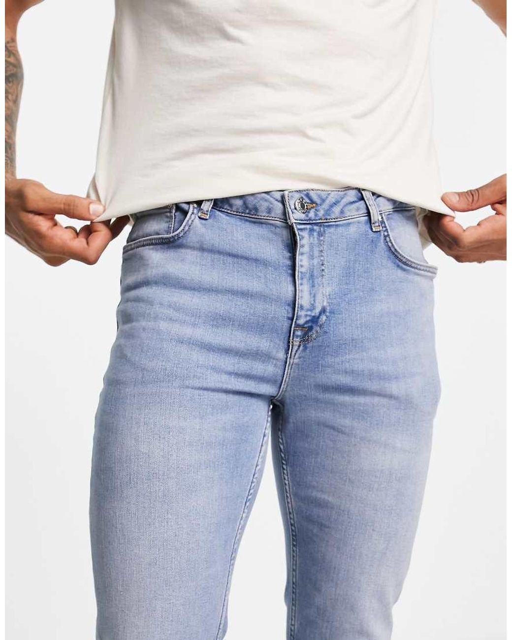 Vaqueros De Campana Elásticos Con Lavado Claro Vintage De ASOS de hombre de color Blue