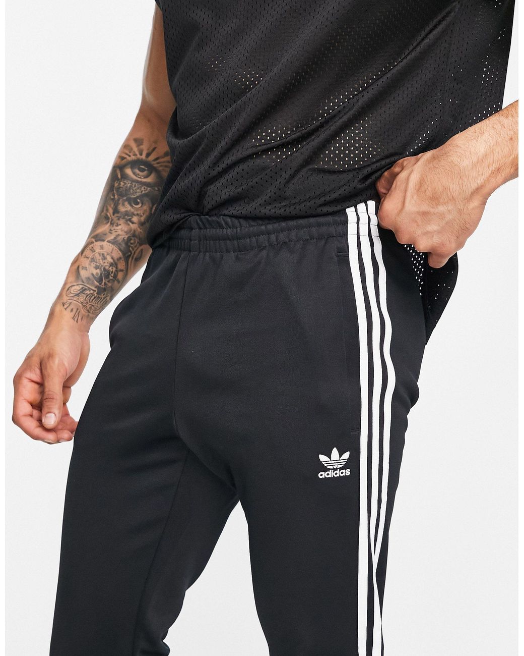 adidas Originals – adicolor primeblue – eng geschnittene jogginghose mit  den drei streifen in Schwarz für Herren - Sparen Sie 14% | Lyst DE