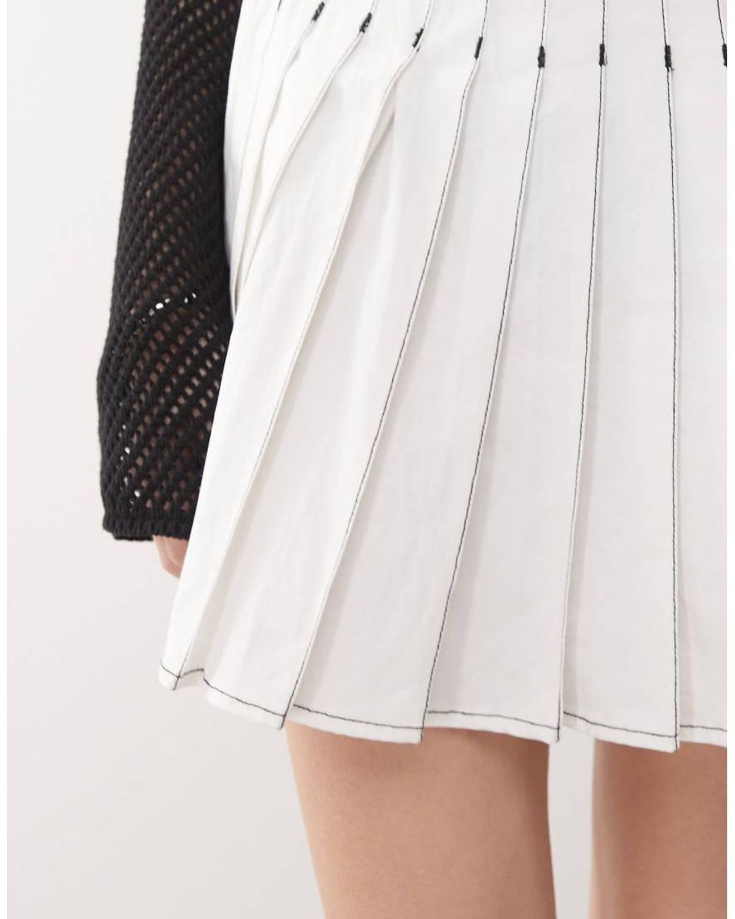 Amy Lynn White Pleated Mini Skirt
