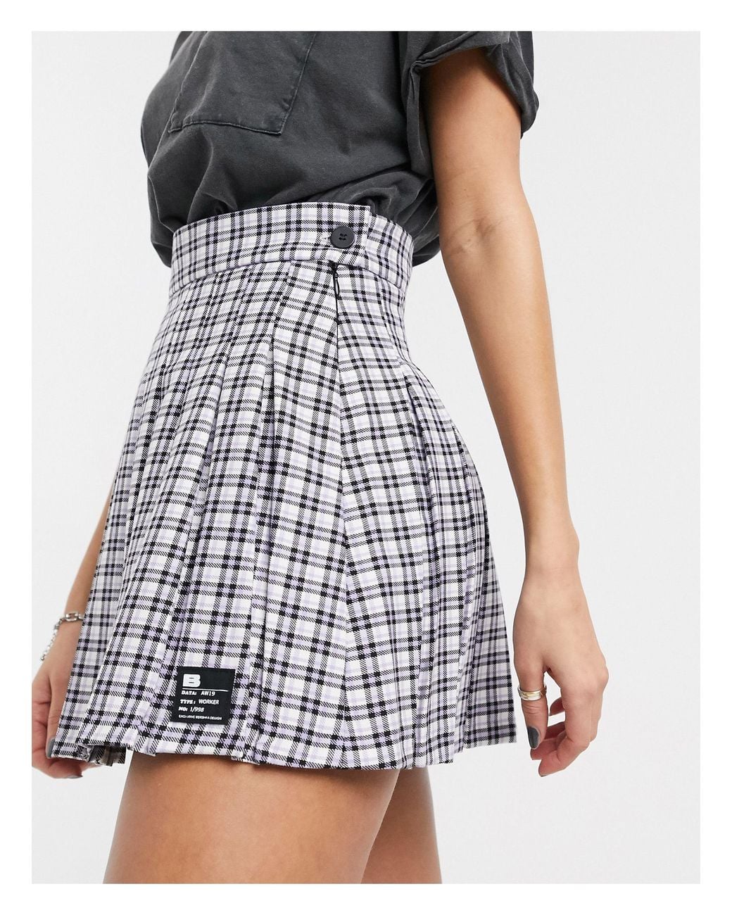 Minifalda plisada a cuadros en color malva Bershka Lyst