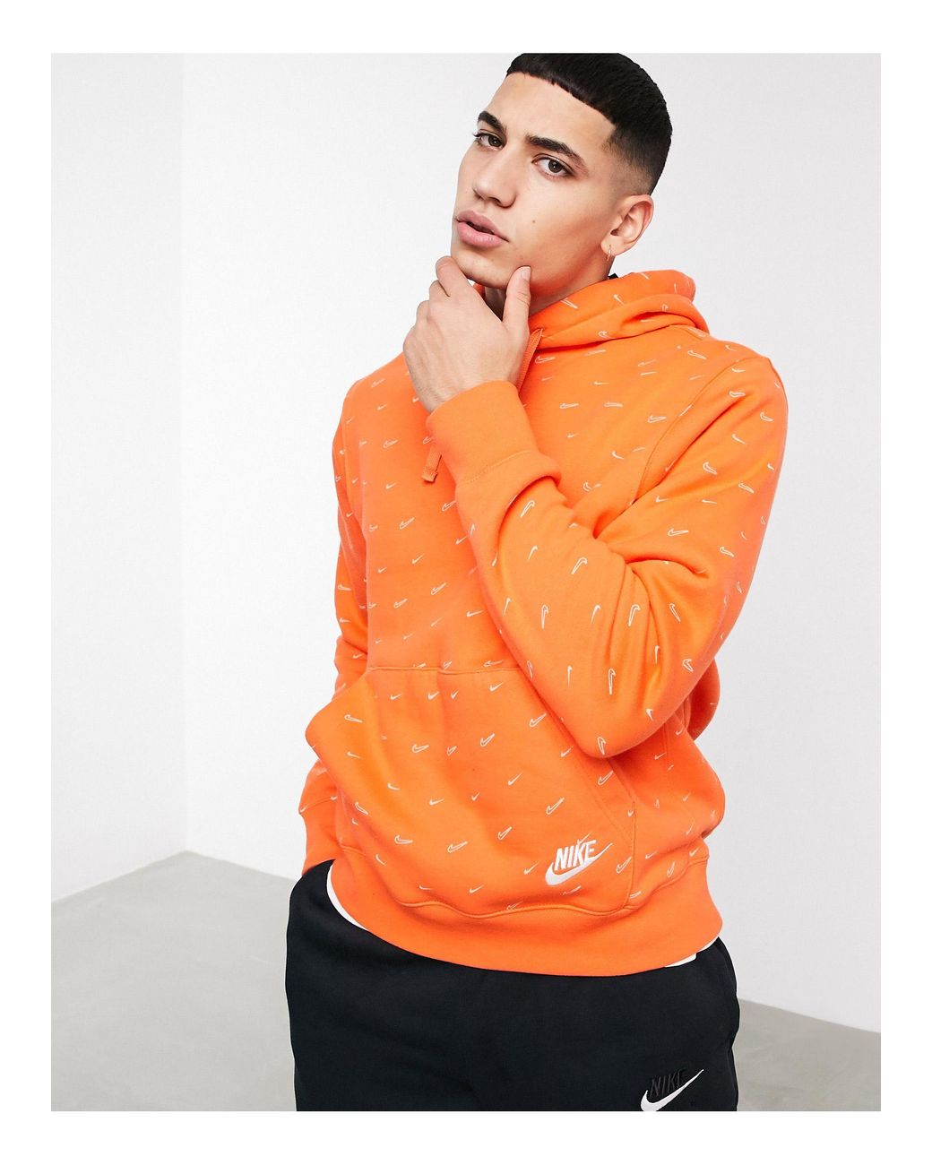 Nike All-over Swoosh Print Hoodie in Orange for Men | Lyst