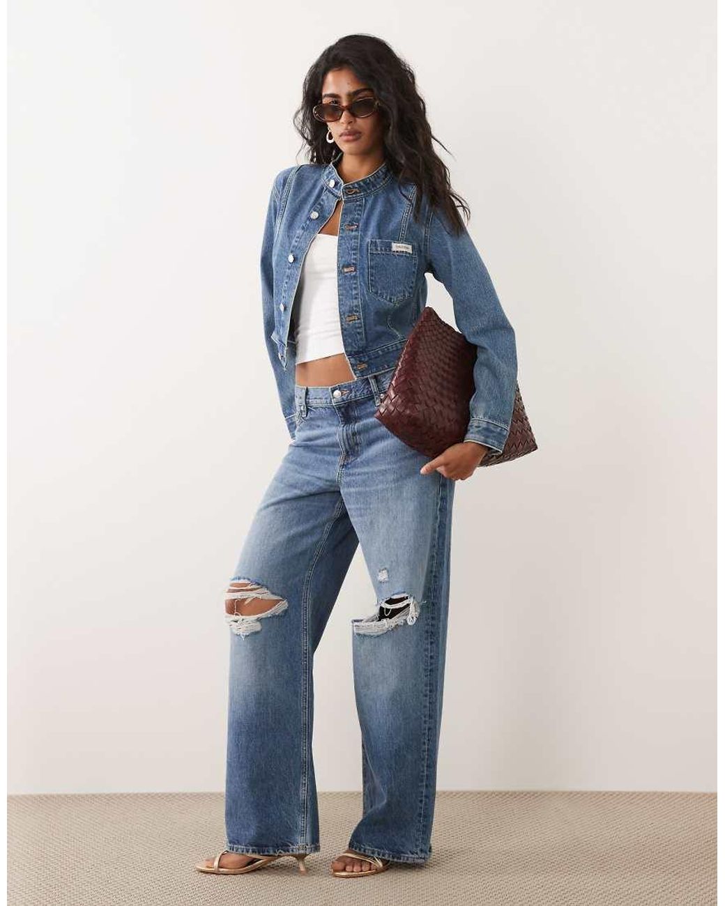 Calvin Klein Blue Cropped Button Up Denim Jacket With High Neck Detail