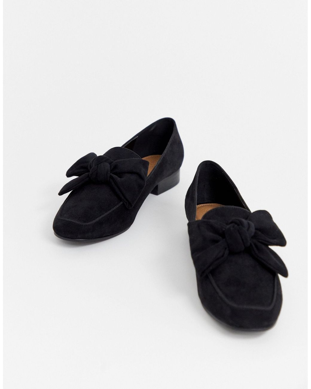 black bow loafers