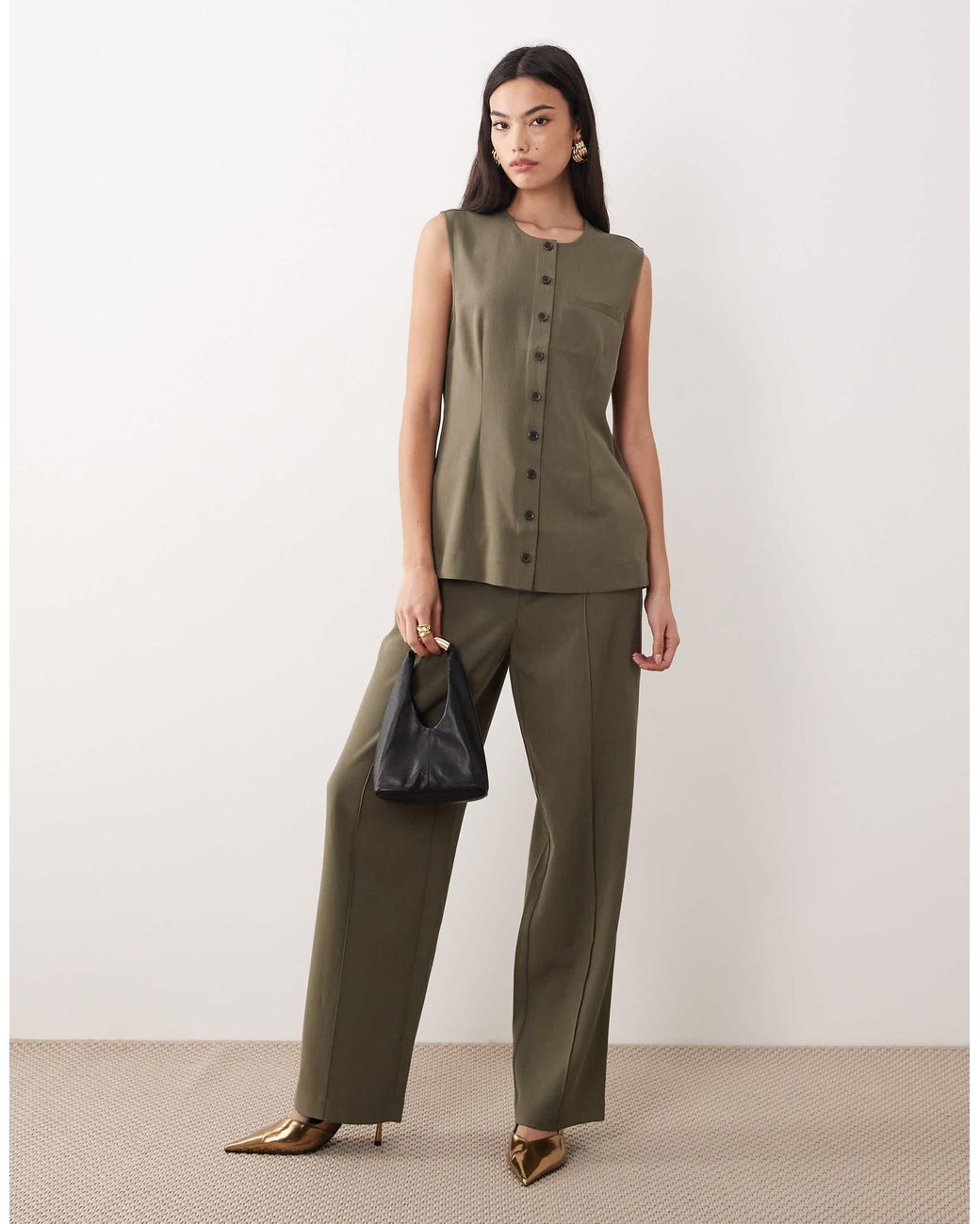 Aware Green – elegante longline-weste