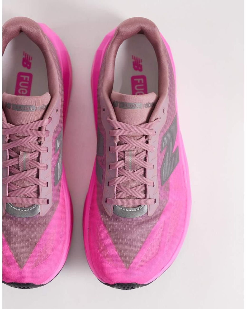 New Balance Pink Fuelcell Rebel V5 Running Trainers for men