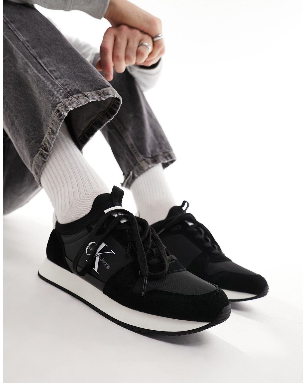 Calvin klein deals black leather trainers
