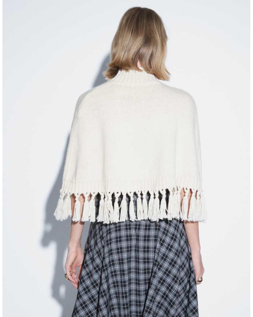 Aria Cove White High Neck Tassel Hem Knitted Poncho Top