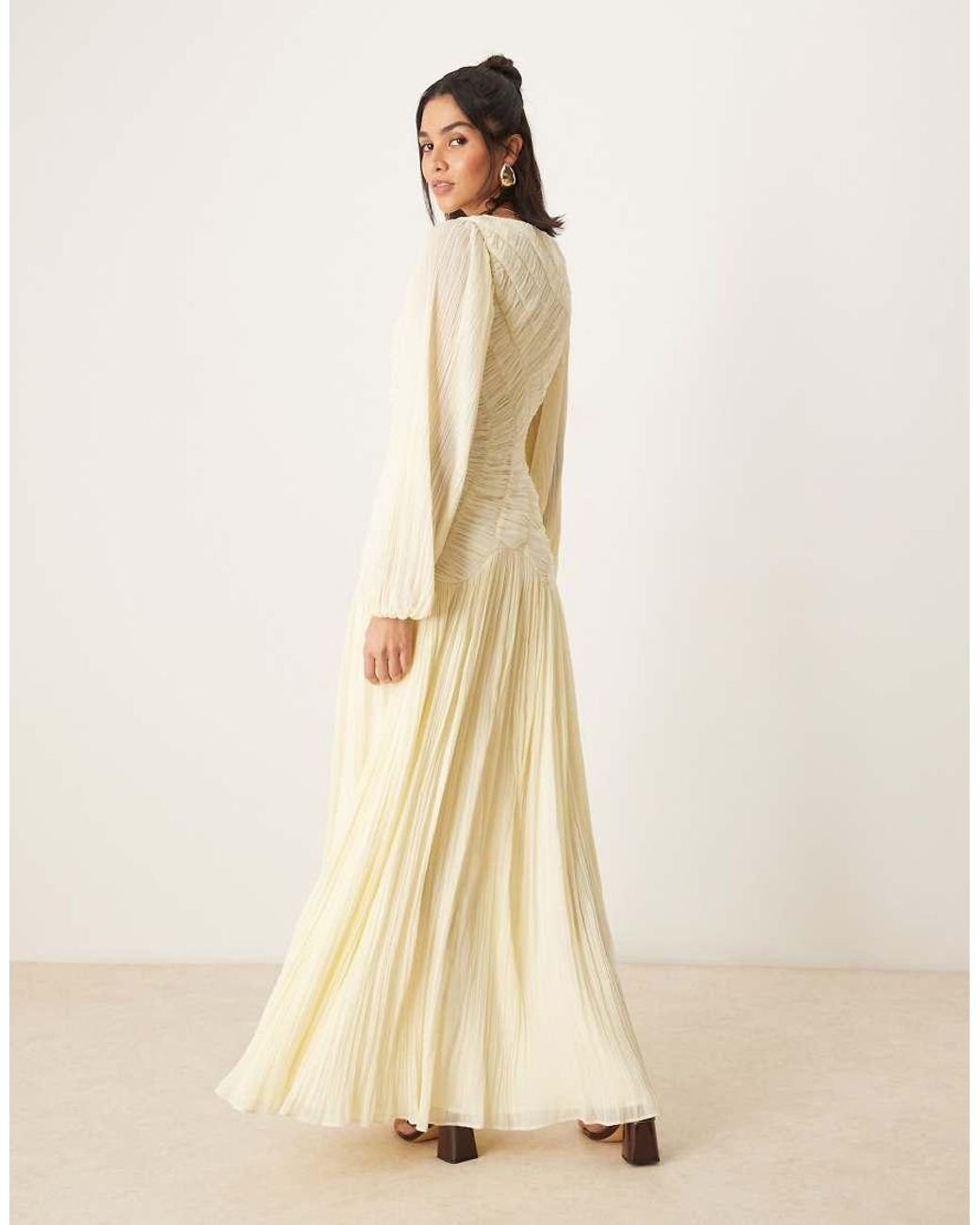asos yellow long sleeve dress ASOS DESIGN cape detail long sleeve maxi dress in soft yellow