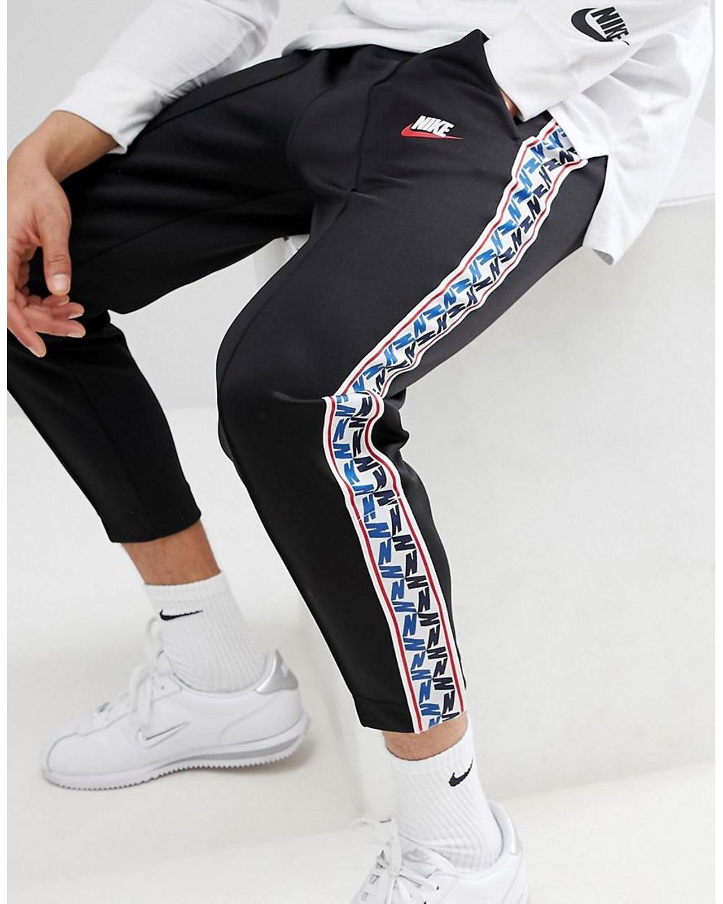 Nike Joggers With Taped In Regular Fit In Black for Men | Lyst UK