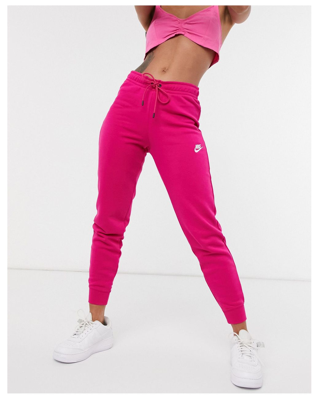 Nike Essential Tight Fit Fleece joggers in Pink | Lyst Australia