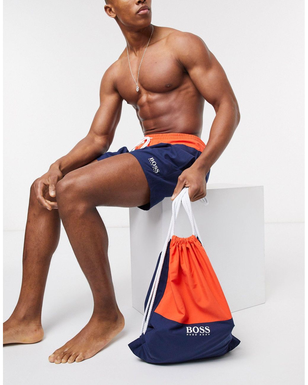 Details about   New  HUGO BOSS Beach Bath Graphic Towel Logo Embossed Navy Blue Orange Men $139 