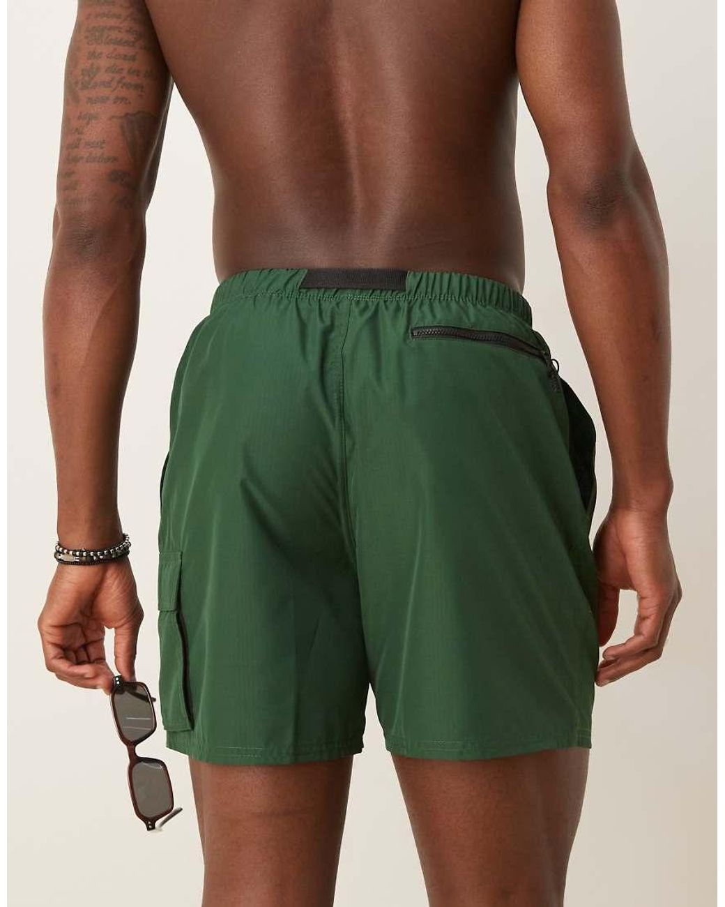 green nike swim trunks
