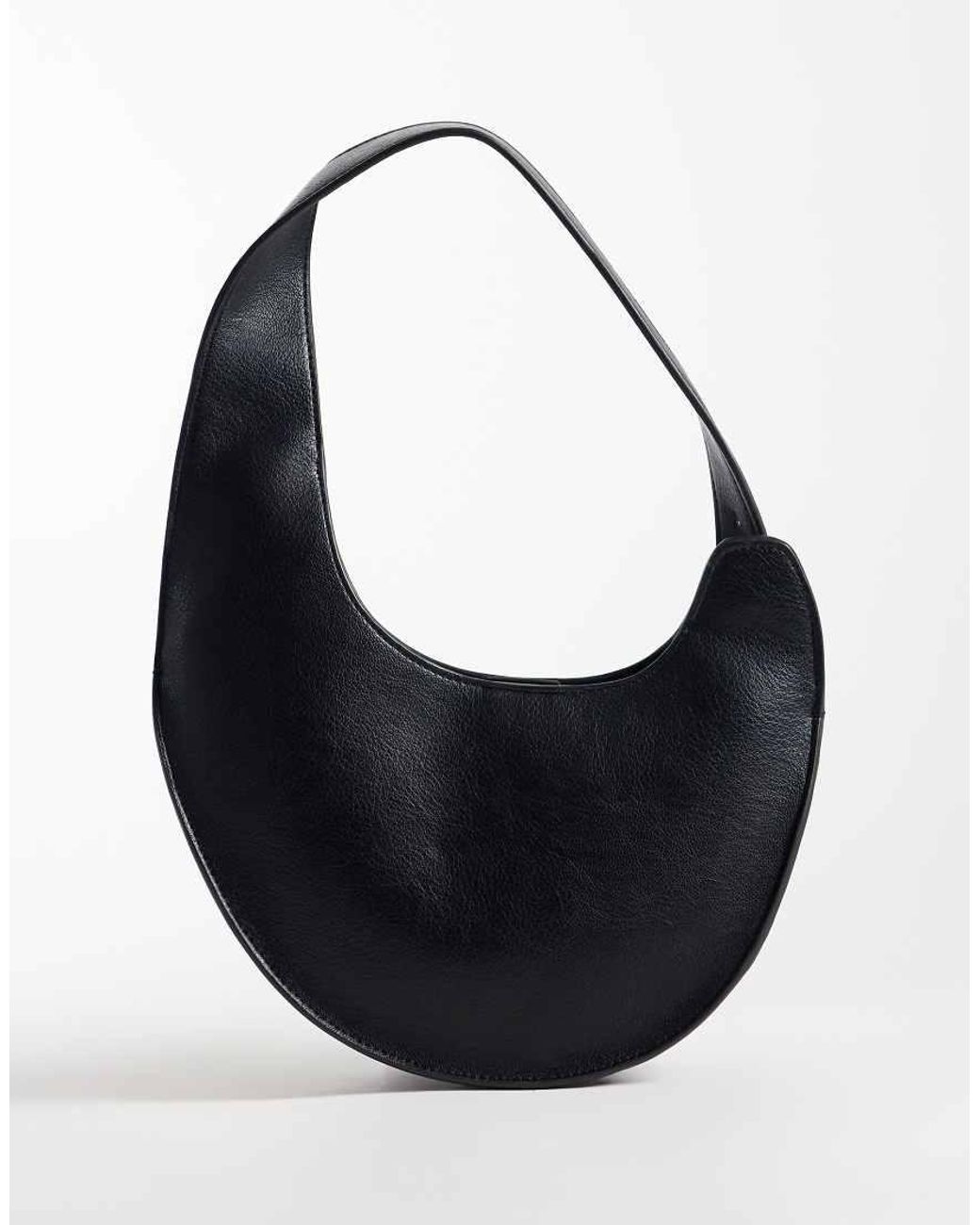 Calvin Klein Black Asymmetrical Buckle Shoulder Bag