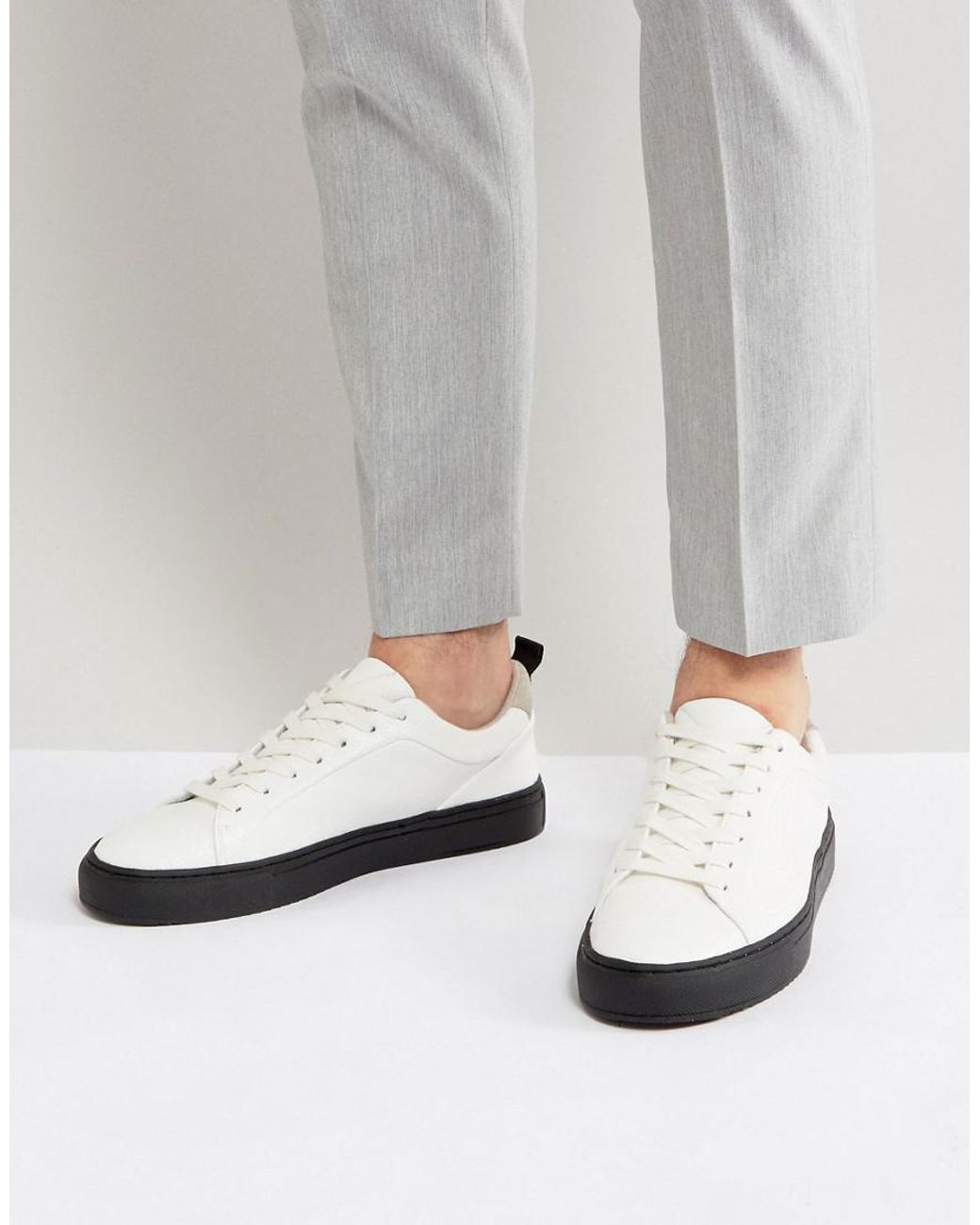 Applicable Slippery surprise ASOS Trainers In White With Contrast Black Sole for Men | Lyst