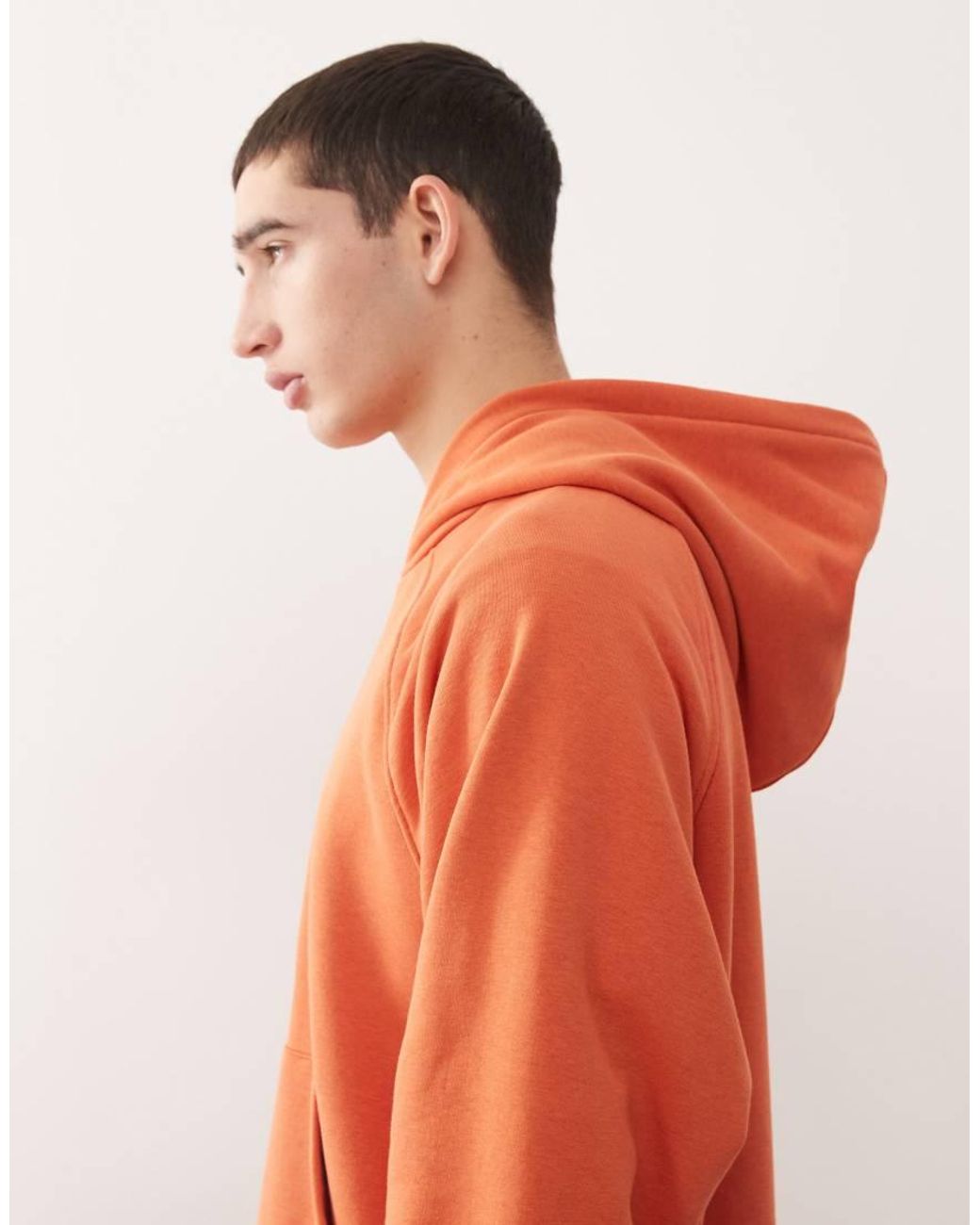 Reclaimed Vintage Orange Raglan Sleeve Oversized Hoodie With Graphic for men