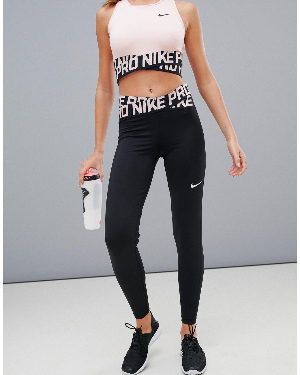 Forståelse forræder samlet set Nike Nike Pro Training Crossover Leggings In Black And Pink | Lyst