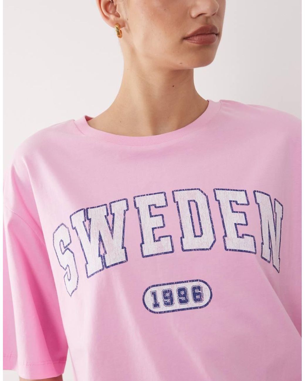 ASOS Pink Oversized T-shirt With Sweden Varsity Graphic