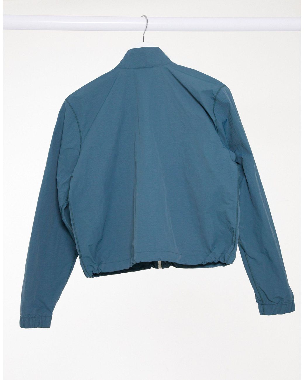 nike tech pack utility jacket in blue