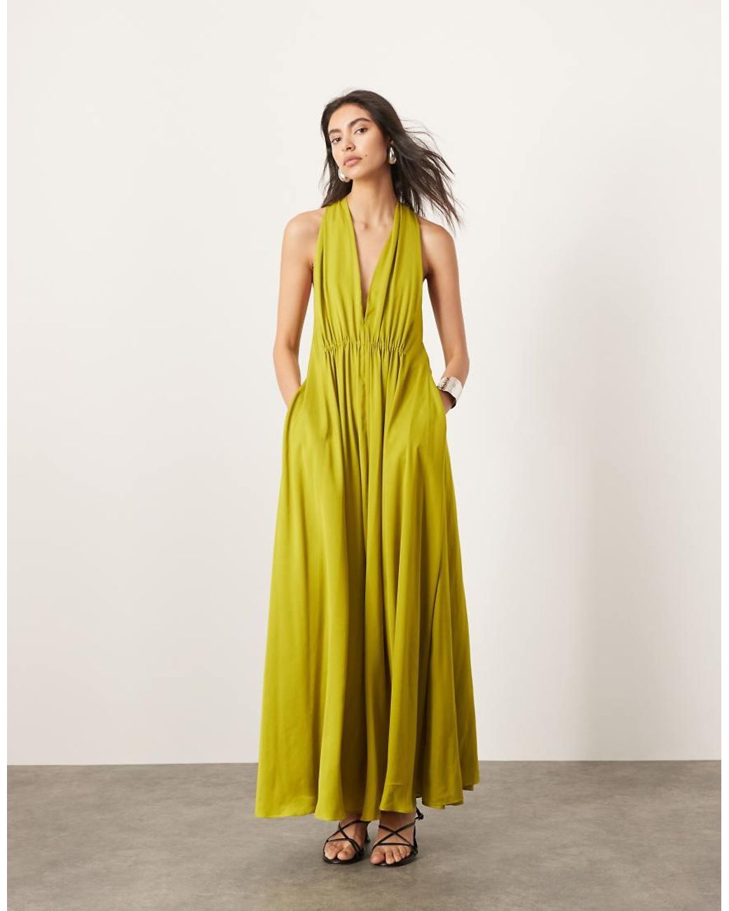 leopard halter maxi dress Leopard print maxi dress featuring a halter neck